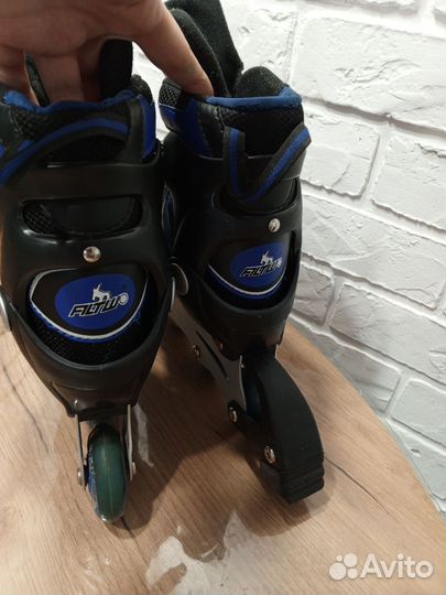 Роликовые коньки