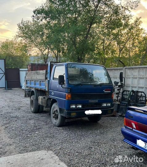 Водитель самосвала