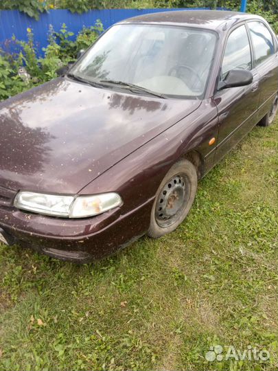 Капот Мазда 626