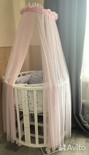 Детская кроватка с маятником круглая