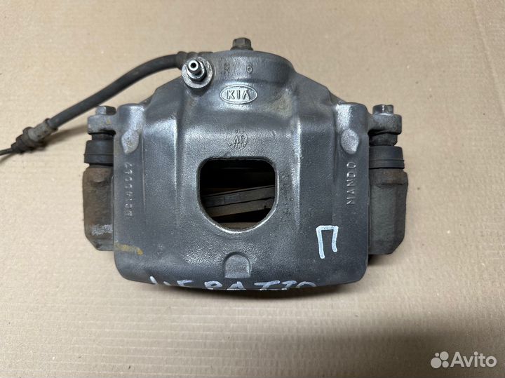 Суппорт передний правый Kia Cerato 1(LD)