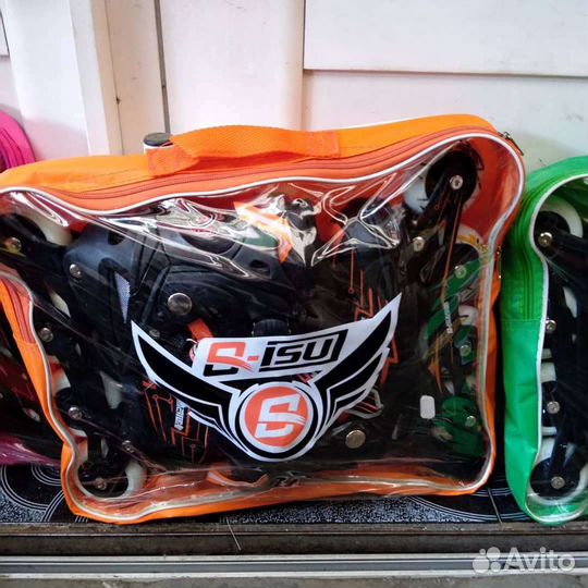 Роликовые коньки