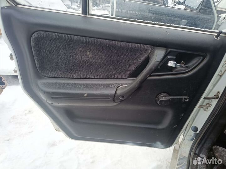 Обшивка дверей задняя левая газ-3110
