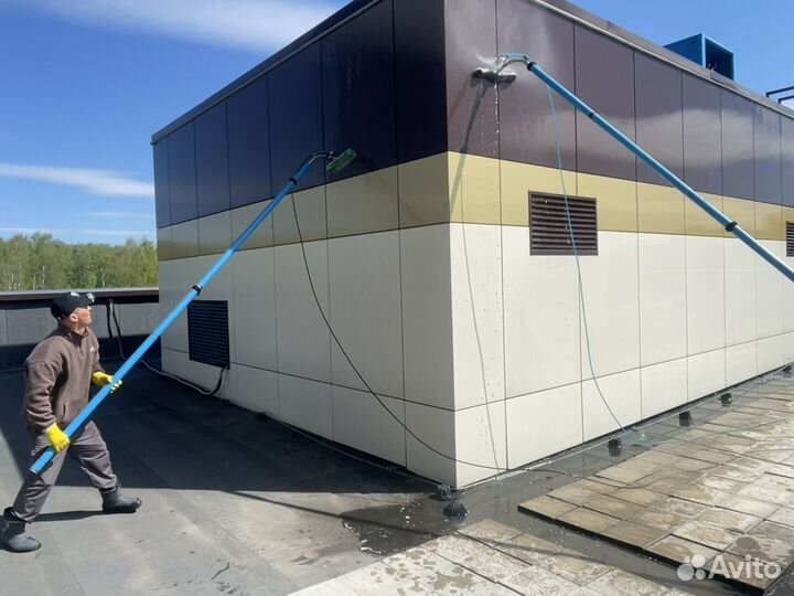 Мойка фасадов и остекления высотных зданий