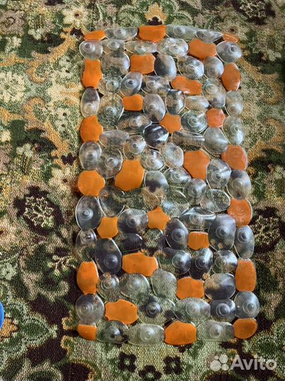 Противоскользящий коврик в ванну