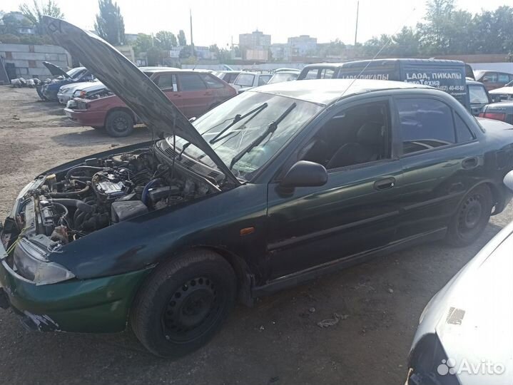 Кулак поворотный правый Mitsubishi Carisma 4G93