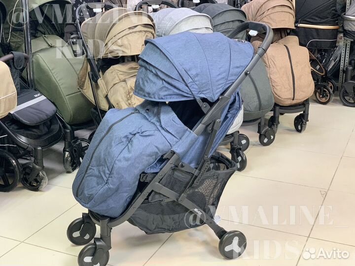 Детская прогулочная коляска с механической спинкой