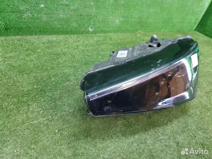 Фара левая Skoda Rapid