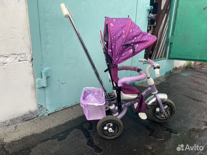 Трехколесный велосипед с ручкой