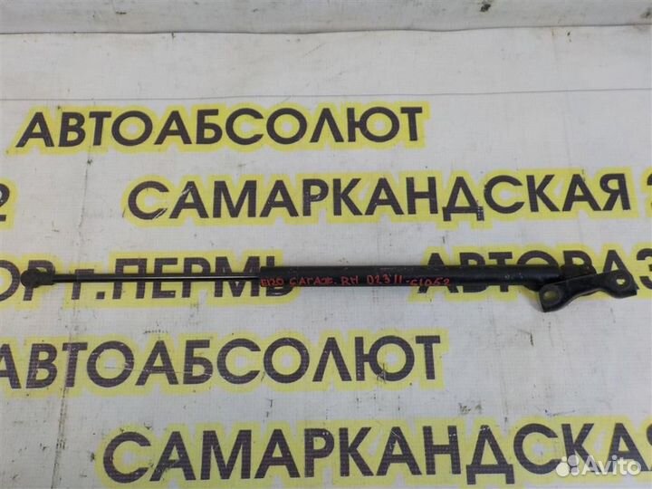 Амортизатор двери багажника Toyota Corolla (E120)