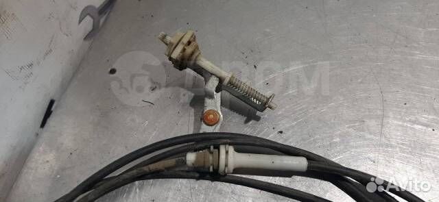 Трос открывания бака (багажника) Nissan March K11