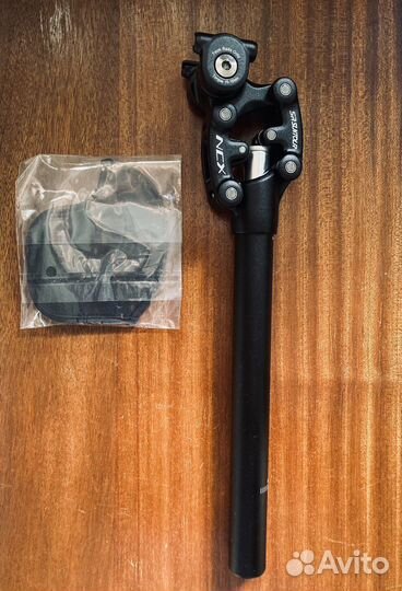 Подседельный штырь Suntour с амортизатором