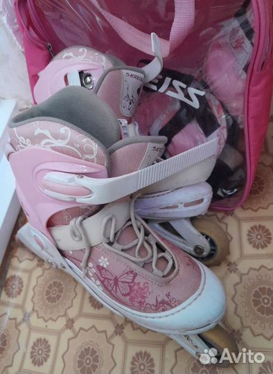 Роликовые коньки