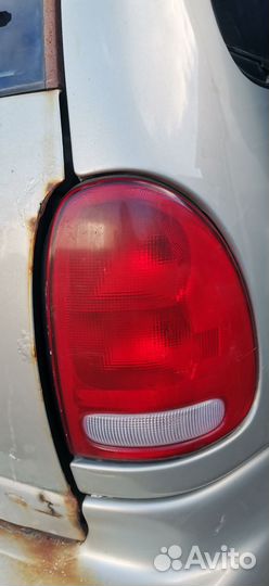 Фонарь задний правый левый Dodge Caravan 3