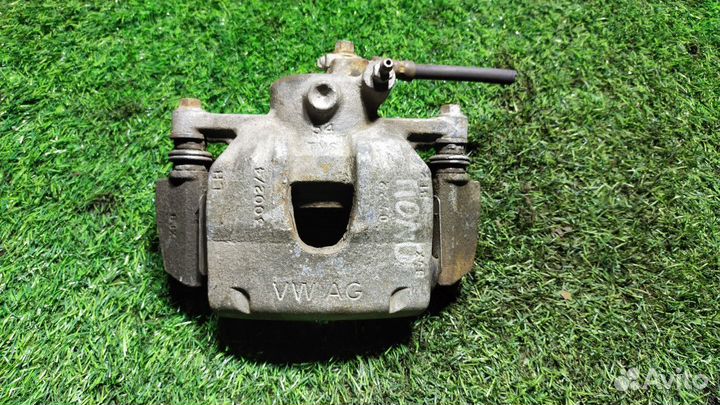 Суппорт передний левый Volkswagen Polo