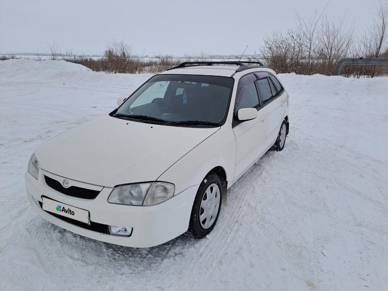 Mazda Familia: фото владельца