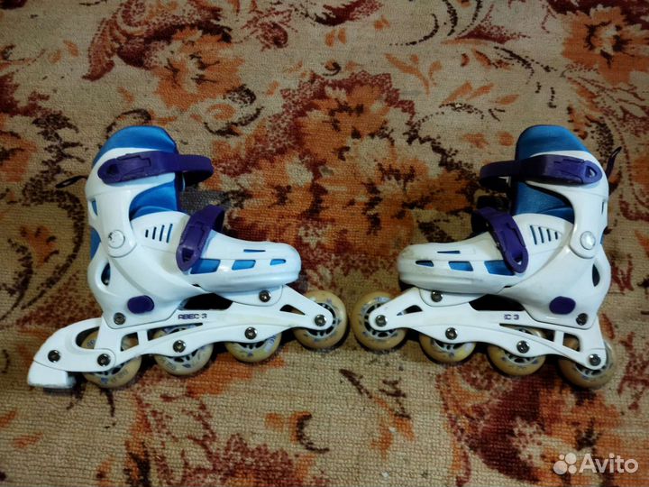 Роликовые коньки