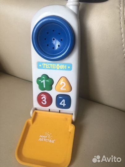 Мобильный телефон игрушка