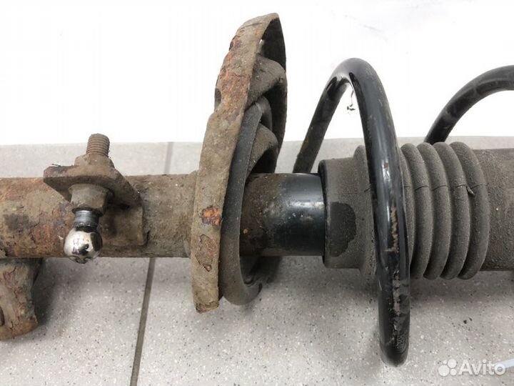 Амортизатор передний левый Nissan Note хэтчбек 5