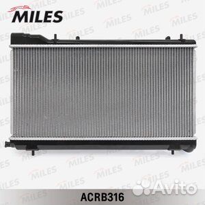 Радиатор двигателя Subaru Forester SF 2.0T