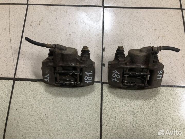 Суппорт тормозной задний Mitsubishi Montero Sport