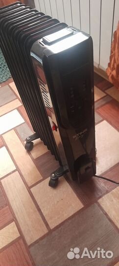 Электрический маслянный радиатор.С пультом