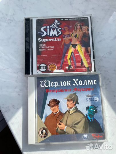 Две комп. игры на CD: Sims Superstar, Шерлок Холмс
