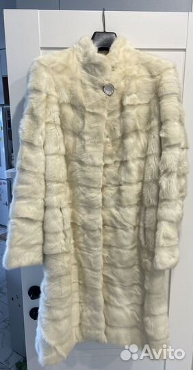 Это не шубка это полошубка(до колена) размер 42