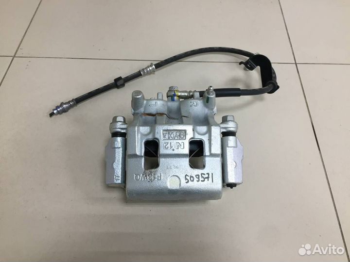 Суппорт передний правый Mitsubishi Pajero/Montero