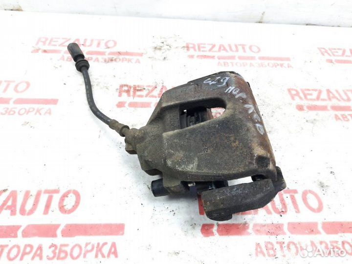 Суппорт тормозной передний левый Ford Focus CB4