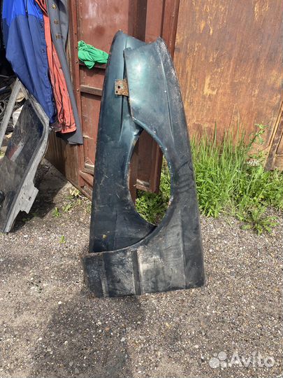 Крыло переднее левое,правое бмв е34