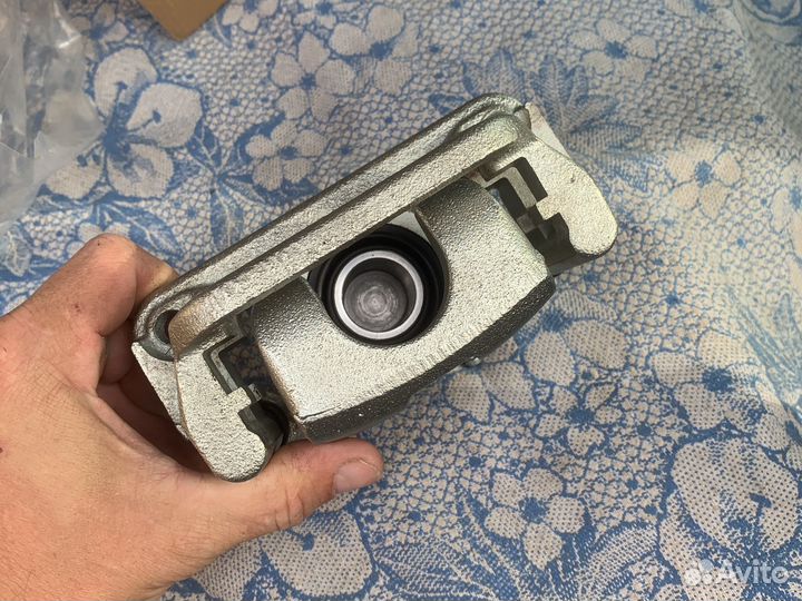 Суппорт тормозной задний левый