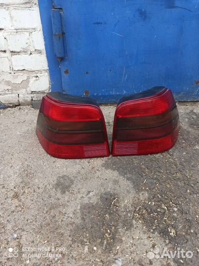 Гольф 4 (хечбек) Фонари Hella L+R оригинал