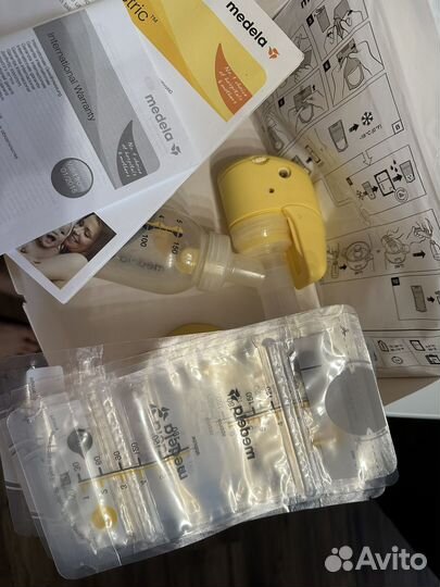 Молокоотсос medela электрический