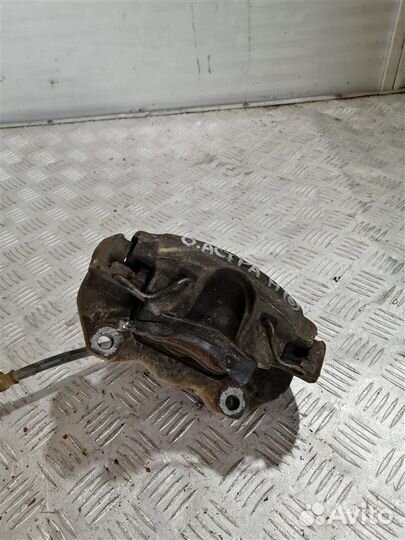 Суппорт тормозной передний правый Opel Astra H L69