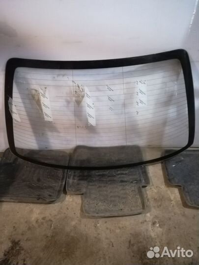 Стекло заднее Nissan Almera Classic