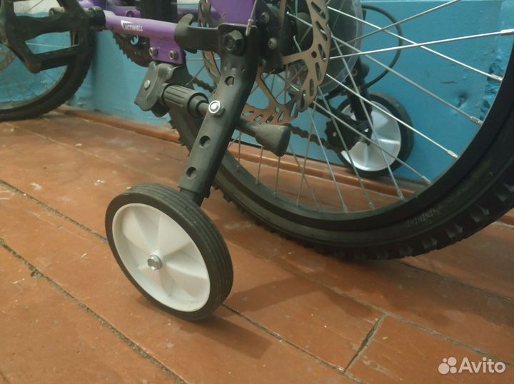 Велосипед с дополнительными колесами