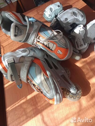 Роликовые коньки