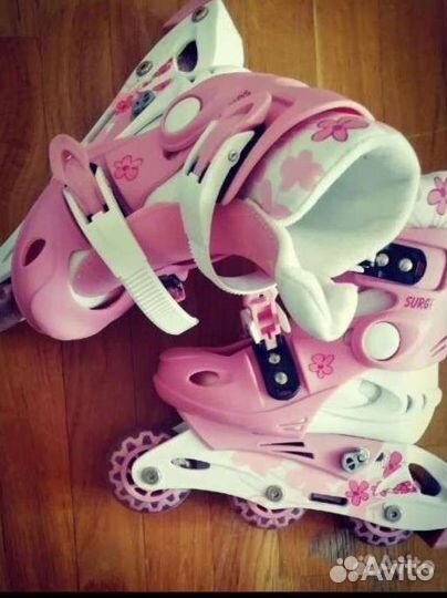 Роликовые коньки