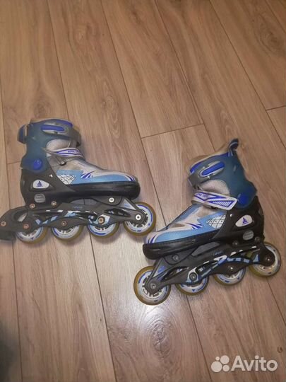 Роликовые коньки