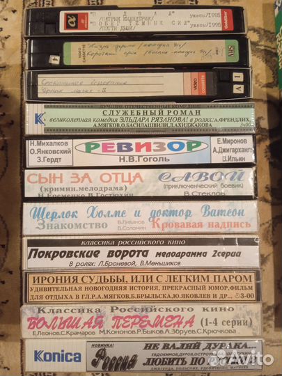 Видеокассеты с фильмами и DVD диски