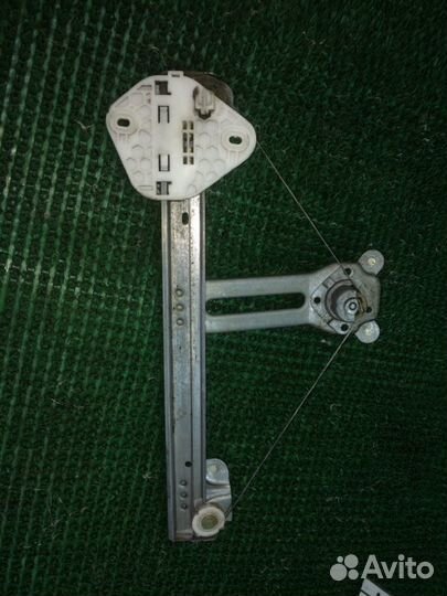 Стеклоподъемник задний левый Renault Logan LS K7J