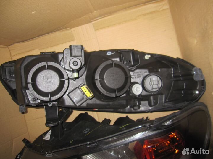 Фара левая Nissan Almera N16E оригинал новая