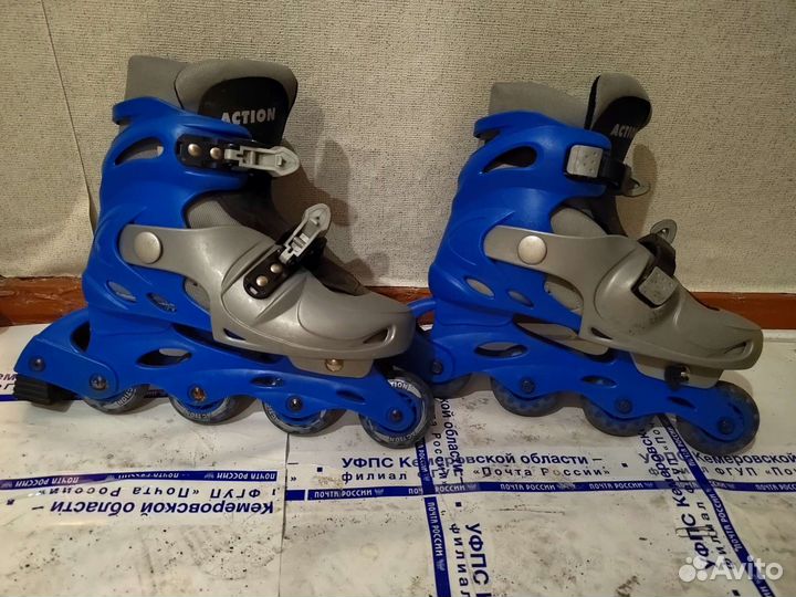 Роликовые коньки