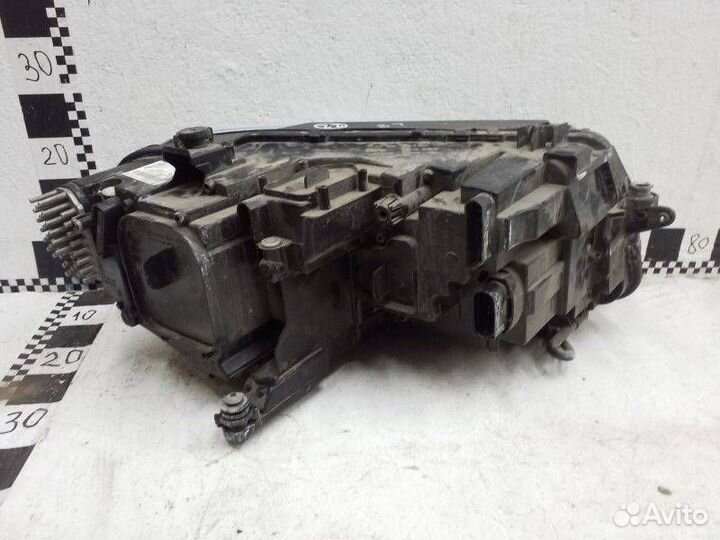 Фара левая Volkswagen Tiguan