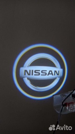 Подсветка в двери с проекцией логотипа Ниссан 2шт