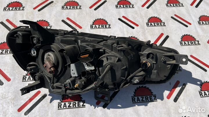 Фара левая на mitsubishi lancer 10