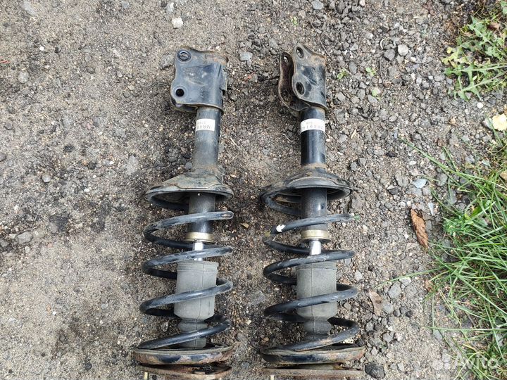 Стойки передние Митсубиси Лансер 9