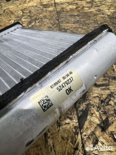 Радиатор печки Опель Астра H