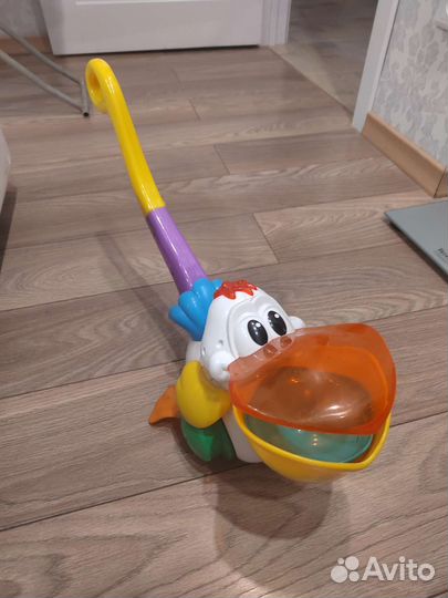 Каталка пеликан интерактивная музыкальная